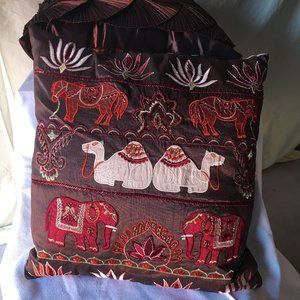 Pier One throw pillow with elephants and camels